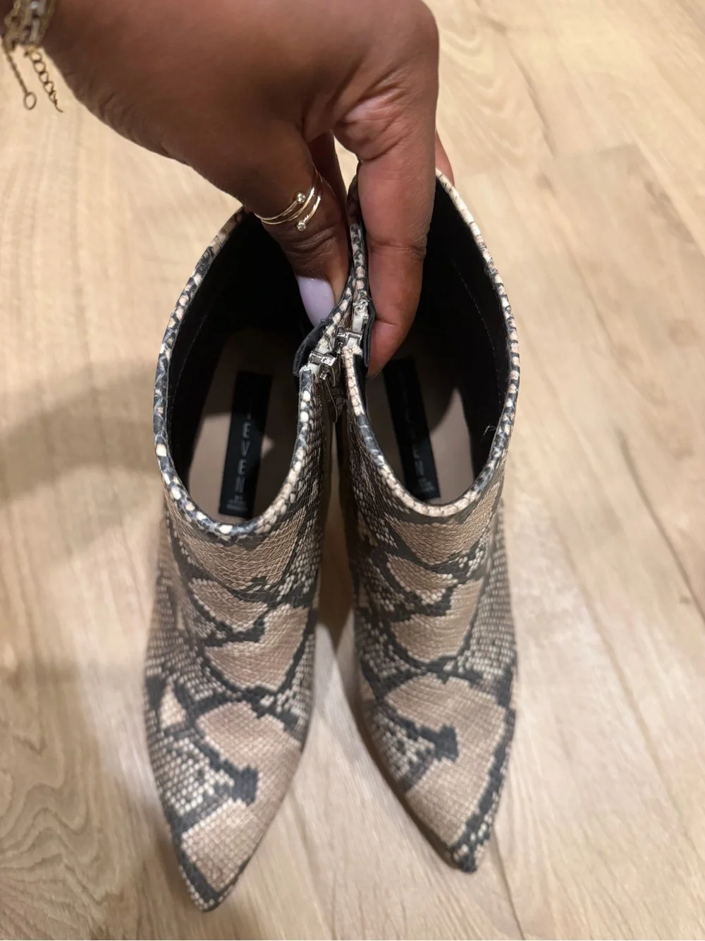 Steven By Steve Madden Snake-Print Pointed Toe Ankle Boots in Beige and Black